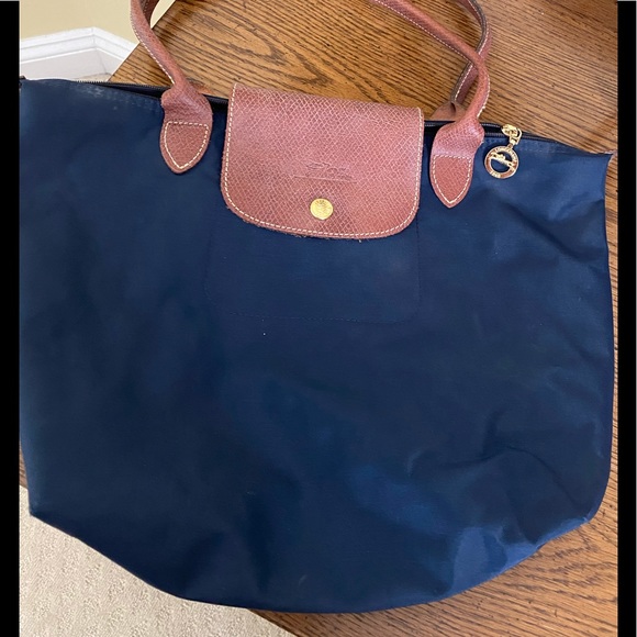 Longchamp Handbags - Longchamp navy with brown leather straps handbag